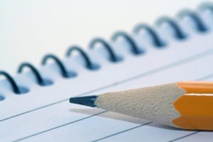 notepad with pencil