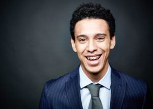 Business man smiling confidently with adult braces